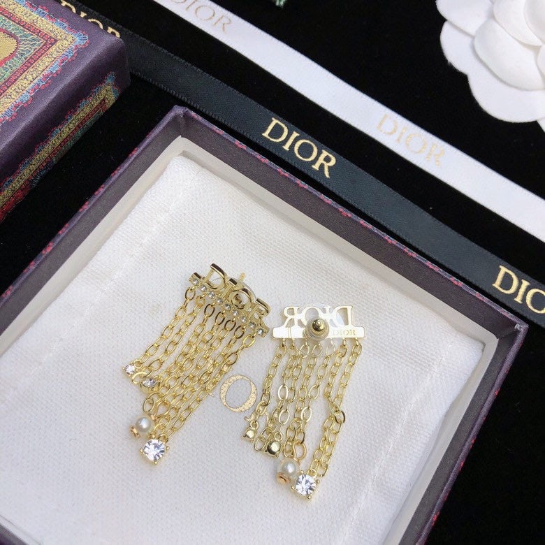 Dior classic CD earrings: We offer FREE SHIPPING for both domestic and international clients who bid over $500. Dior's classic CD earrings feature a unique and elegant CD logo design, and their sophisticated color scheme allow