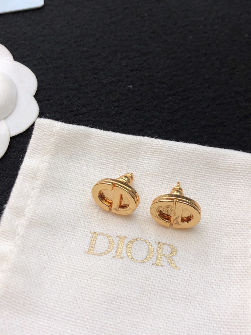 Dior gold mini CD earrings: We offer FREE SHIPPING for both domestic and international clients who bid over $500. Dior gold mini CD earrings are small and exquisite, perfect for everyday wear and commuting. Every detail has been