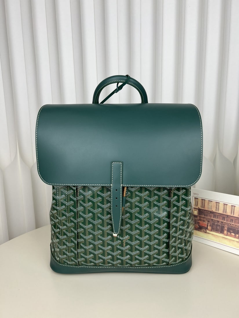 Goyard Alpin MM: We offer FREE SHIPPING for both domestic and international clients who bid over $500. The Goyard Alpin MM men's flap backpack is a design by Goyard specifically for urban adventurers. A reinvention of
