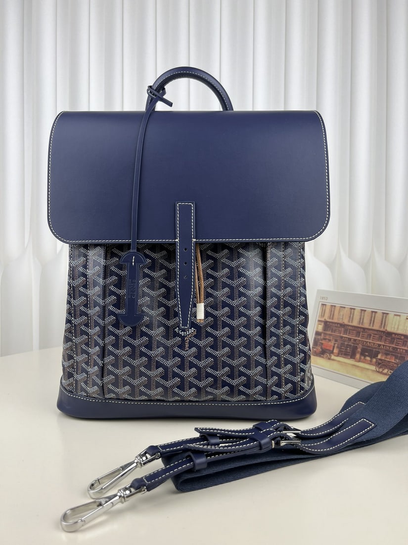 Goyard Alpin MM: We offer FREE SHIPPING for both domestic and international clients who bid over $500. The Goyard Alpin MM men's flap backpack is a design by Goyard specifically for urban adventurers. A reinvention of