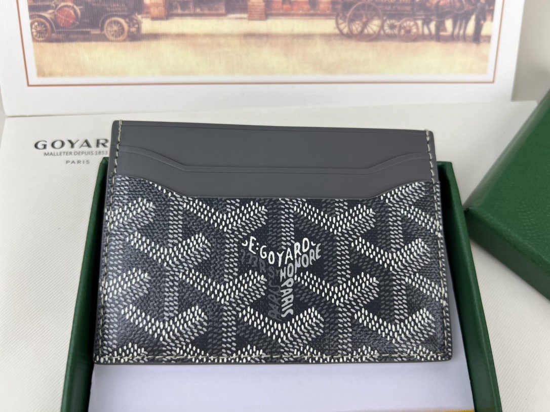 Goyard Saint-Sulpice: We offer FREE SHIPPING for both domestic and international clients who bid over $500. The Goyard Saint-Sulpice cardholder features a compact design with a central pocket for cards, ID cards, or