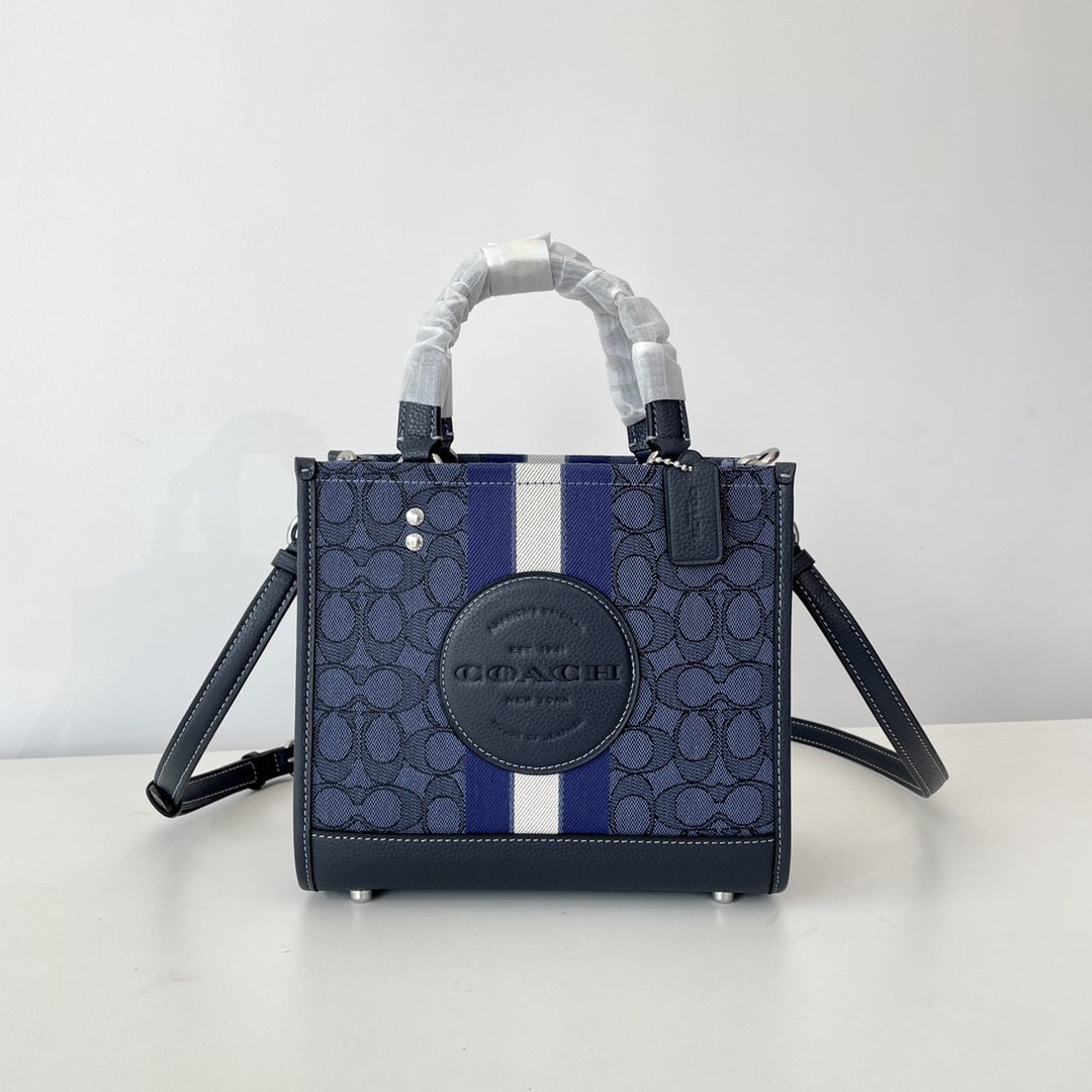 COACH: We offer FREE SHIPPING for both domestic and international clients who bid over $500. COACH classic stripe and COACH appliqu?? DEMPSEY 22 tote bag, fabric and cowhide leather, interior zip pocket and 