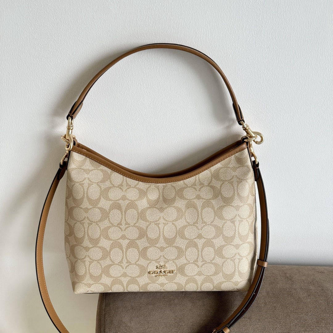 COACH laurel: We offer FREE SHIPPING for both domestic and international clients who bid over $500. CR149 Laurel series hobo bag, a classic milk tea color monogram canvas bag with brown top-grain cowhide leather. I