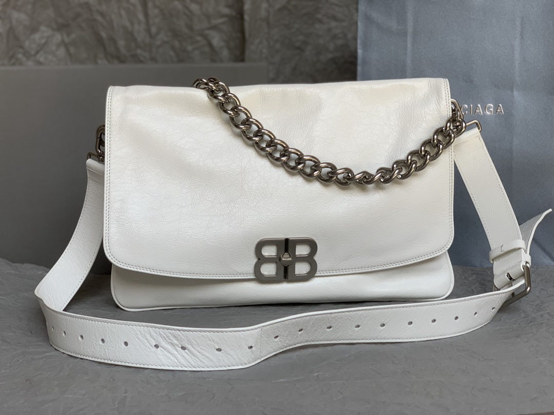 Balenciaga: We offer FREE SHIPPING for both domestic and international clients who bid over $500. The white Balenciaga BB Soft crossbody shoulder bag has a simple, casual, and unisex design, making it suitable fo