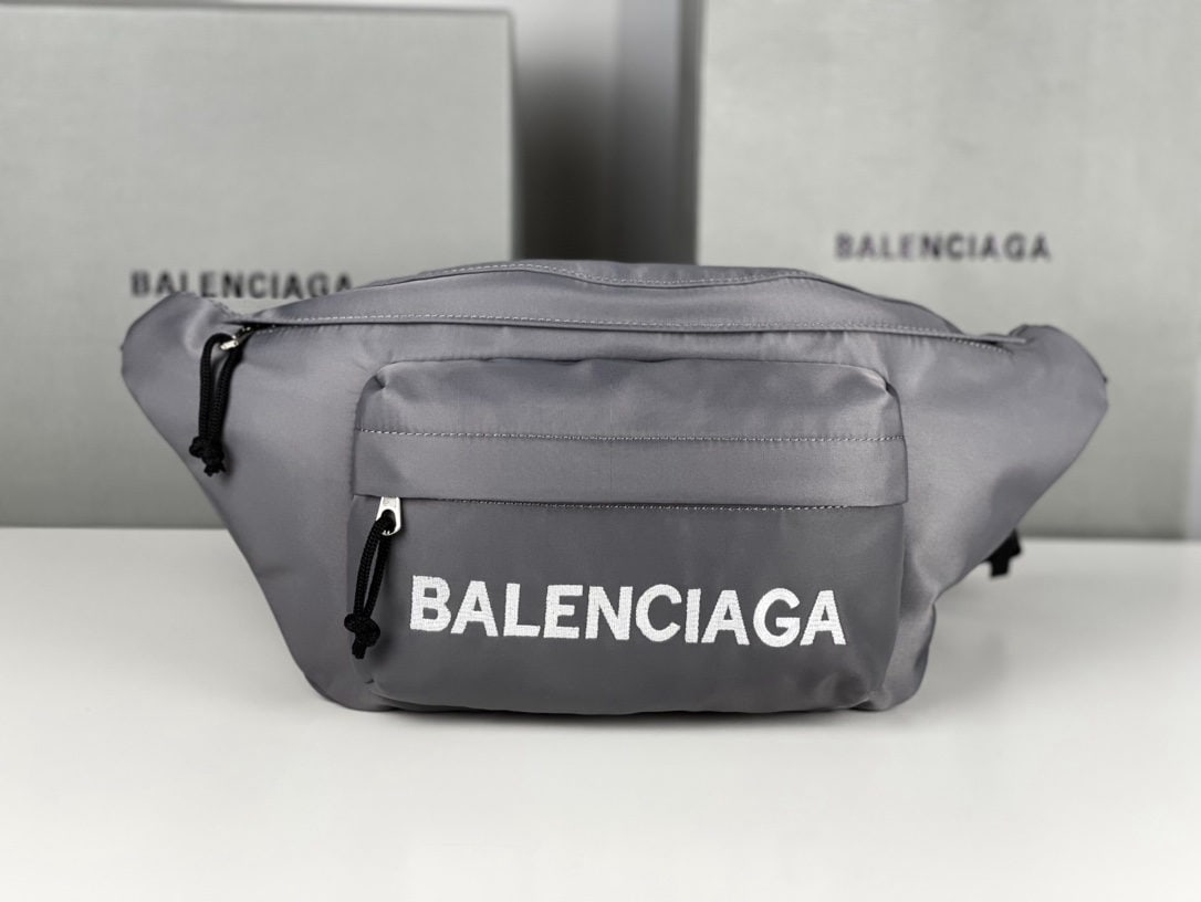 Balenciaga: We offer FREE SHIPPING for both domestic and international clients who bid over $500. Balenciaga canvas embroidered waist bag in grey has been incredibly popular these past two years. It seems like ev