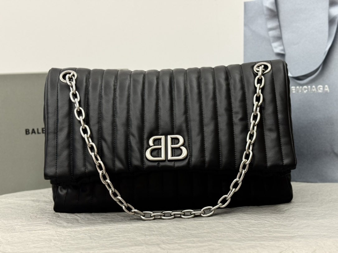 Balenciaga: We offer FREE SHIPPING for both domestic and international clients who bid over $500. The Balenciaga Monaco series in black and silver with embroidered stitches is incredibly soft. The Monaco bag trul