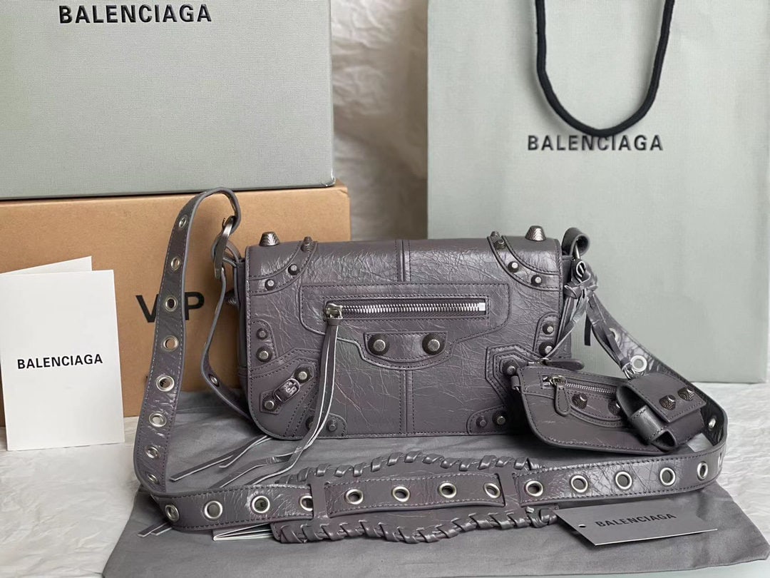 Balenciaga: We offer FREE SHIPPING for both domestic and international clients who bid over $500. Balenciaga's horizontal camera motorcycle bag in waxed grey is increasingly popular. This Balenciaga motorcycle ba