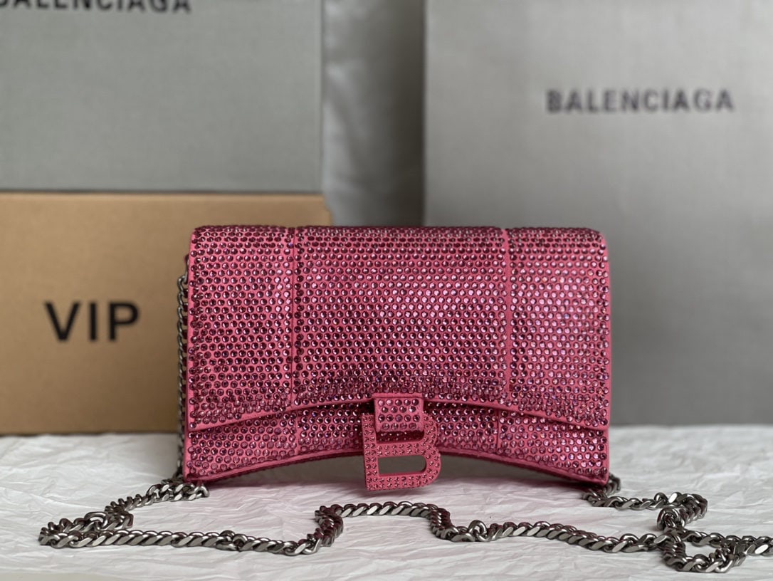 Balenciaga: We offer FREE SHIPPING for both domestic and international clients who bid over $500. The Balenciaga Hourglass bag with its full diamond detail is irresistible to any girl. It's perfect for a night ou
