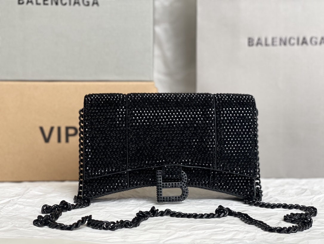 Balenciaga: We offer FREE SHIPPING for both domestic and international clients who bid over $500. The Balenciaga Hourglass bag with its full diamond detail is irresistible to any girl. It's perfect for a night ou