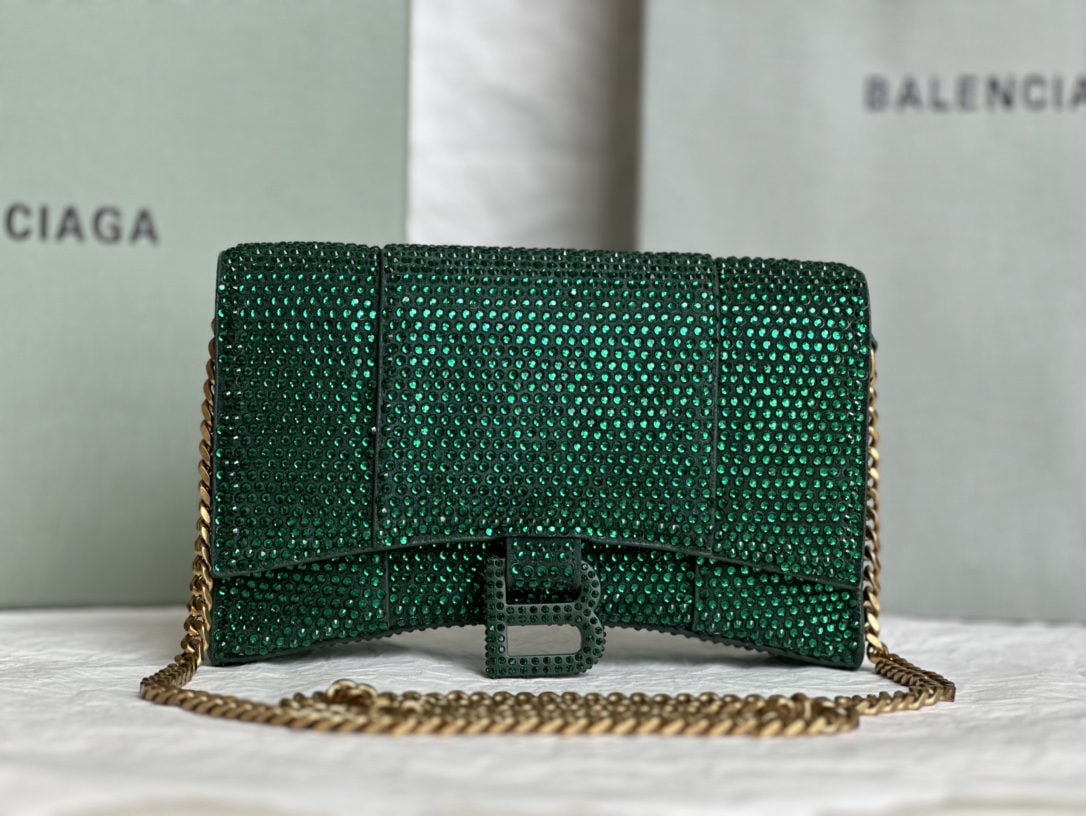 Balenciaga: We offer FREE SHIPPING for both domestic and international clients who bid over $500. The Balenciaga Hourglass bag with its full diamond detail is irresistible to any girl. It's perfect for a night ou