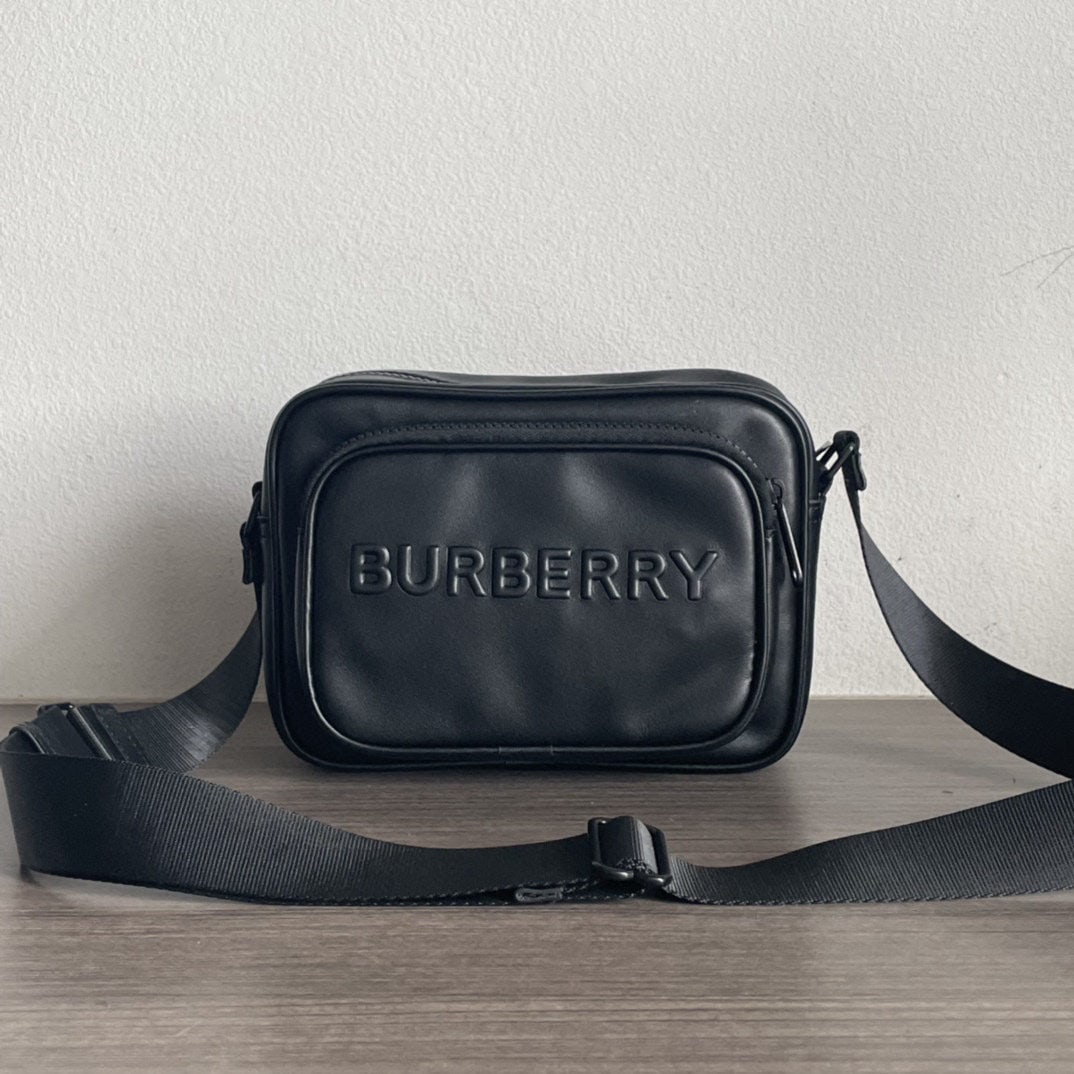 Burberry: We offer FREE SHIPPING for both domestic and international clients who bid over $500. Burberry embossed leather camera bag, unisex, made of Nappa calfskin, with a quality that surpasses any other genu