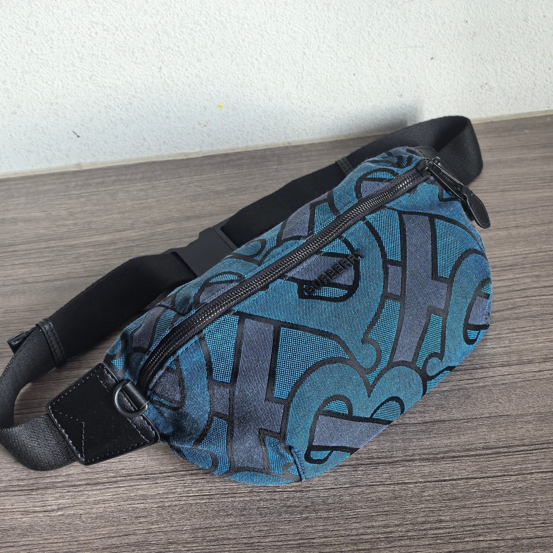 Burberry: We offer FREE SHIPPING for both domestic and international clients who bid over $500. This Burberry belt bag draws inspiration from 90s streetwear, crafted from nylon and adorned with a jacquard jacqu