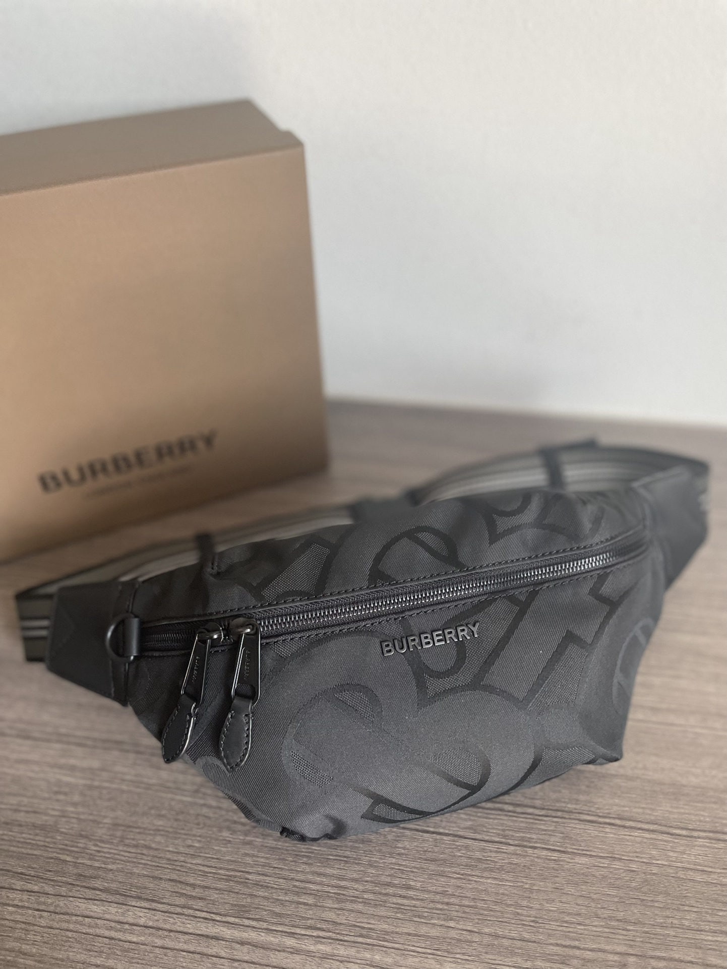 Burberry: We offer FREE SHIPPING for both domestic and international clients who bid over $500. This Burberry belt bag draws inspiration from 90s streetwear, crafted from nylon and adorned with a jacquard jacqu