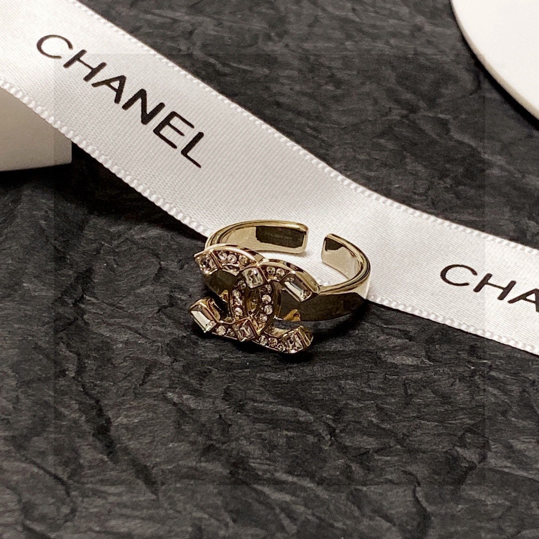 Chanel double C diamond ring: We offer FREE SHIPPING for both domestic and international clients who bid over $500. Chanel double C diamond ring! The simple design is exquisite, makes your hands look fair, and is very versatile,