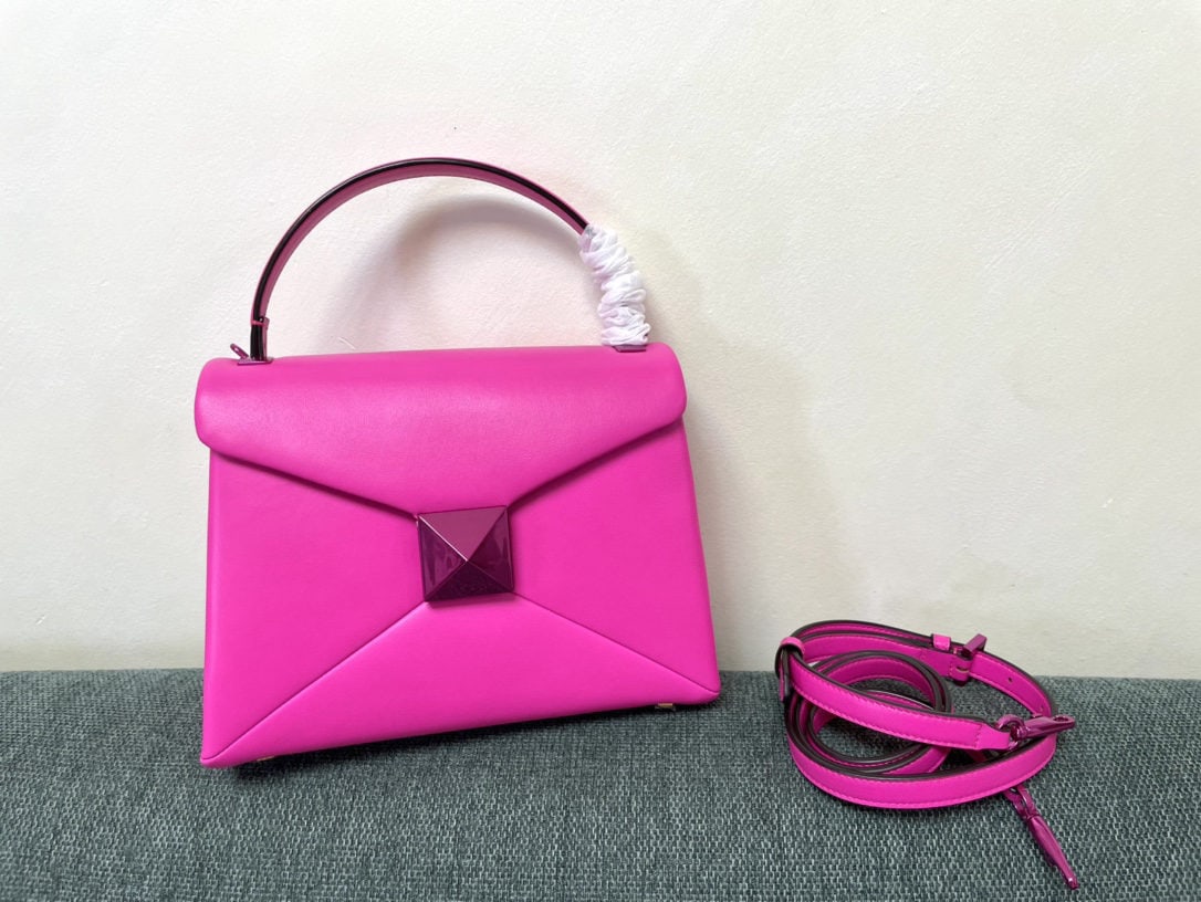 Valentino ONE STUD: We offer FREE SHIPPING for both domestic and international clients who bid over $500. Rose pink VALENTINO ONE STUD studded lambskin handbag, can be worn as a shoulder or crossbody bag - vintage brass 