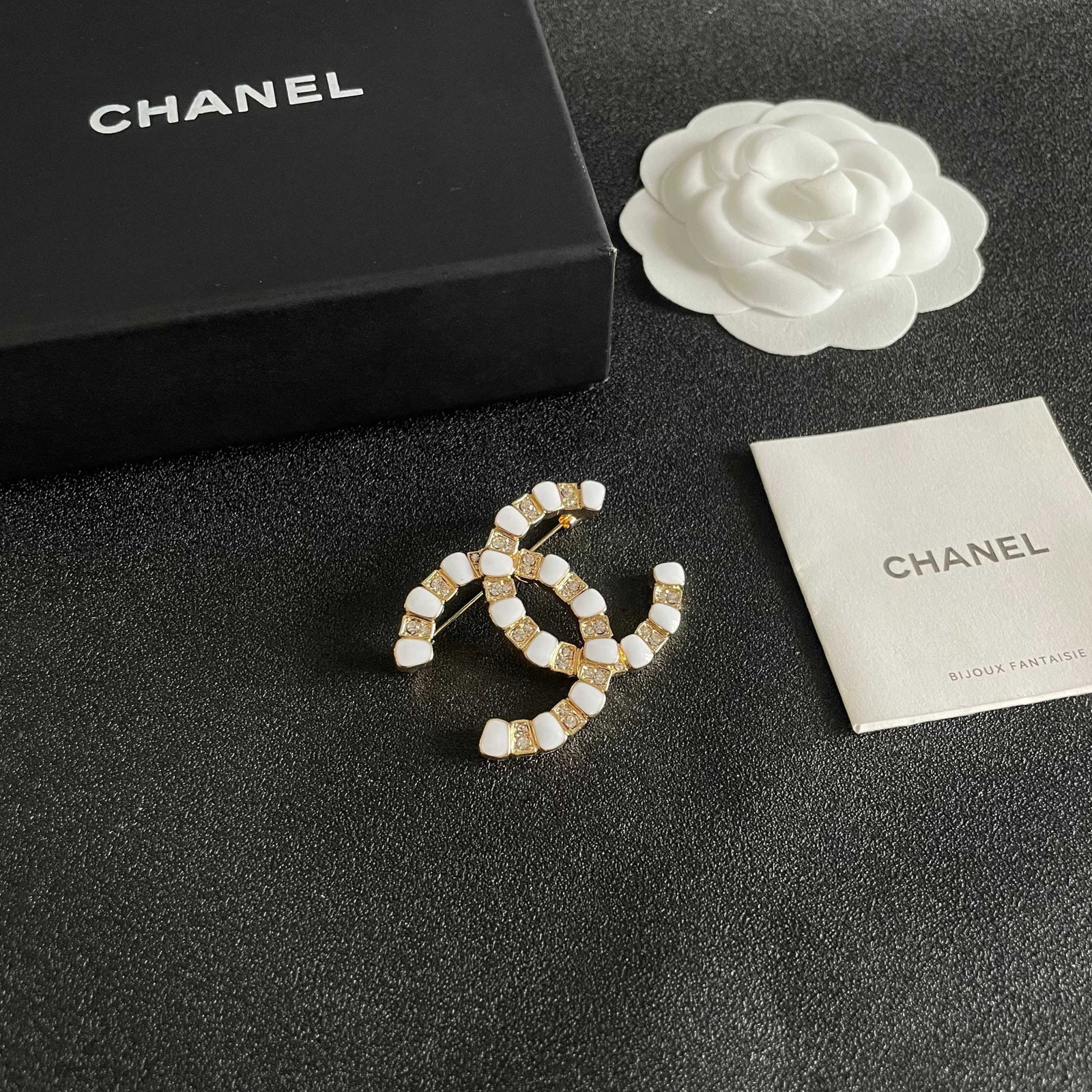 CHANEL Brooch: We offer FREE SHIPPING for both domestic and international clients who bid over $500. CHANEL brooches are the accessories that truly understand women. Women who have poured their hearts and souls into