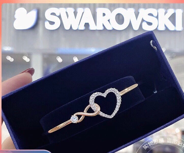 SWAROVSKI Infinite Heart Bracelet for Women: We offer FREE SHIPPING for both domestic and international clients who bid over $500. SWAROVSKI Infinite Heart Bracelet for Women A wonderful gift for you or your loved one. Currencies including USD,
