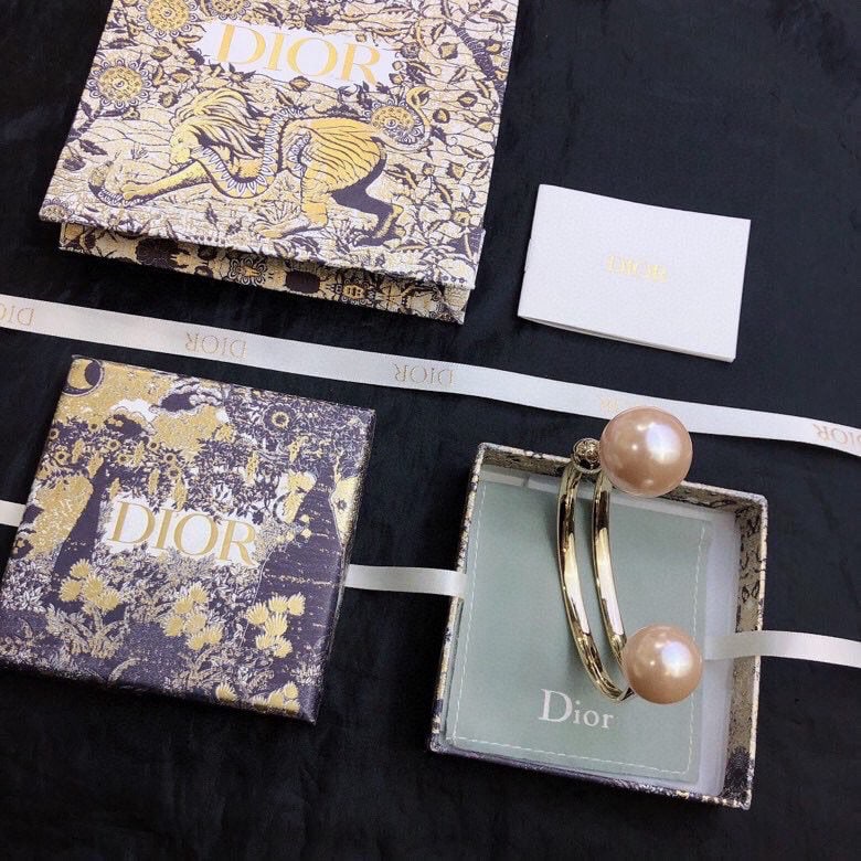 Dior Fall/Winter Letter Pearl Open Bangle: We offer FREE SHIPPING for both domestic and international clients who bid over $500. Dior Fall/Winter Letter Pearl Open Bangle A wonderful gift for you or your loved one. Currencies including USD, CA