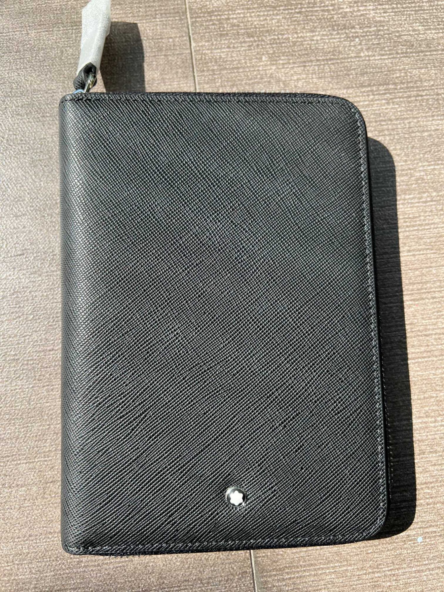 MONTBLANC Heart Series Passport Holder Pouch: We offer FREE SHIPPING for both domestic and international clients who bid over $500. MONTBLANC Heart Series Passport Holder Bag, Classic Black. Material: Top Grain Cowhide. Dimensions: 20x15x2 mm. A 