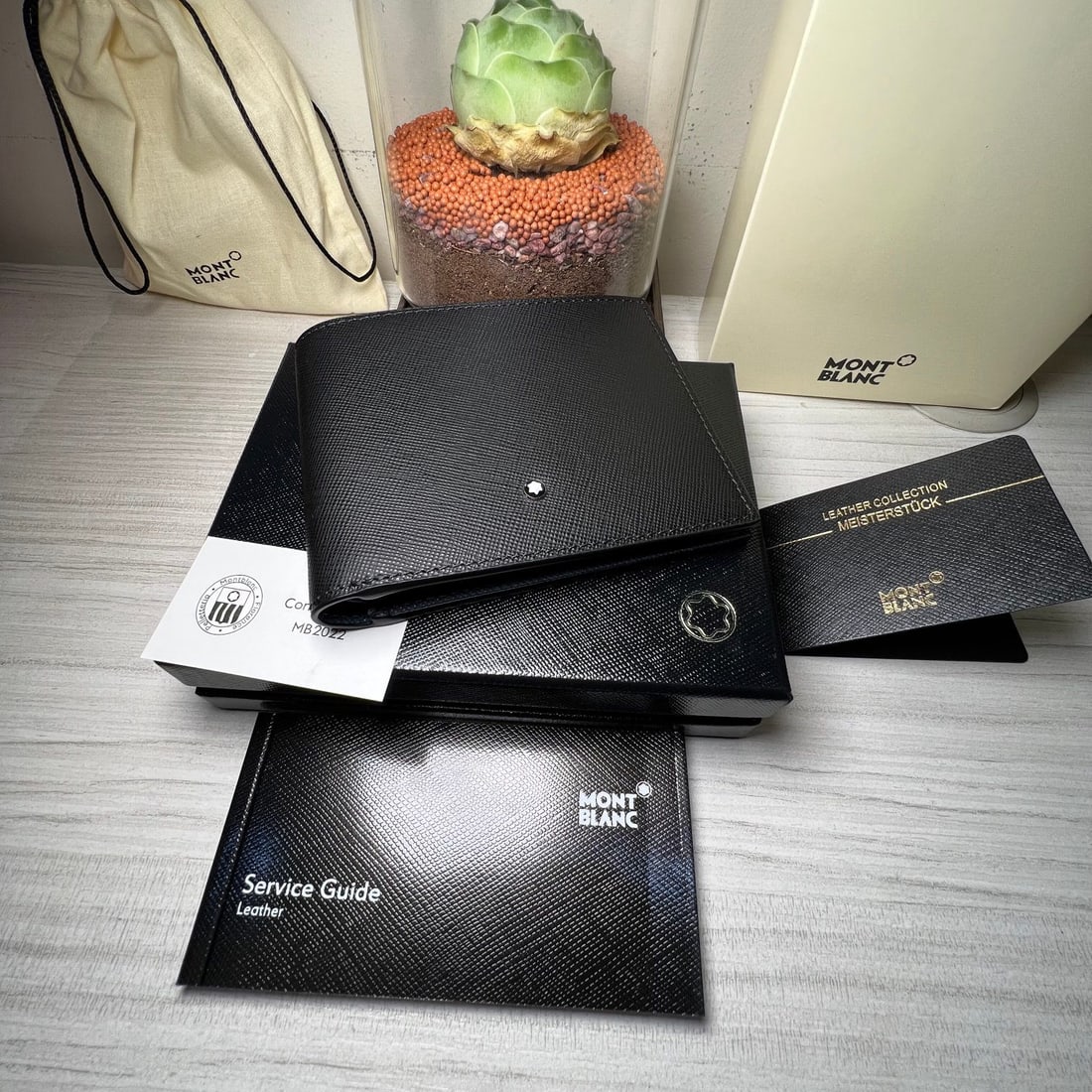 MONTBLANC Masterpiece Series 6-Card Slot Wallet: We offer FREE SHIPPING for both domestic and international clients who bid over $500. MONTBLANC Masterpiece Series 6-Card Slot Wallet with Blue Inner Compartment Material: Top-grain embossed cross-gra