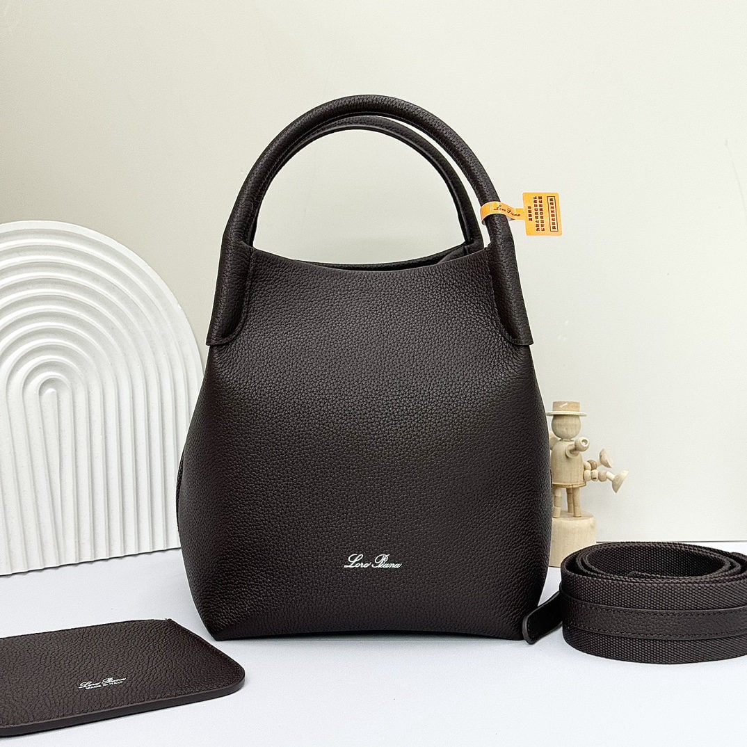 Loro piana Bale Medium Bucket Bag: We offer FREE SHIPPING for both domestic and international clients who bid over $500. The Loro Piana Bale Medium Bucket Bag in coffee color is crafted from premium calfskin leather with a suede lining