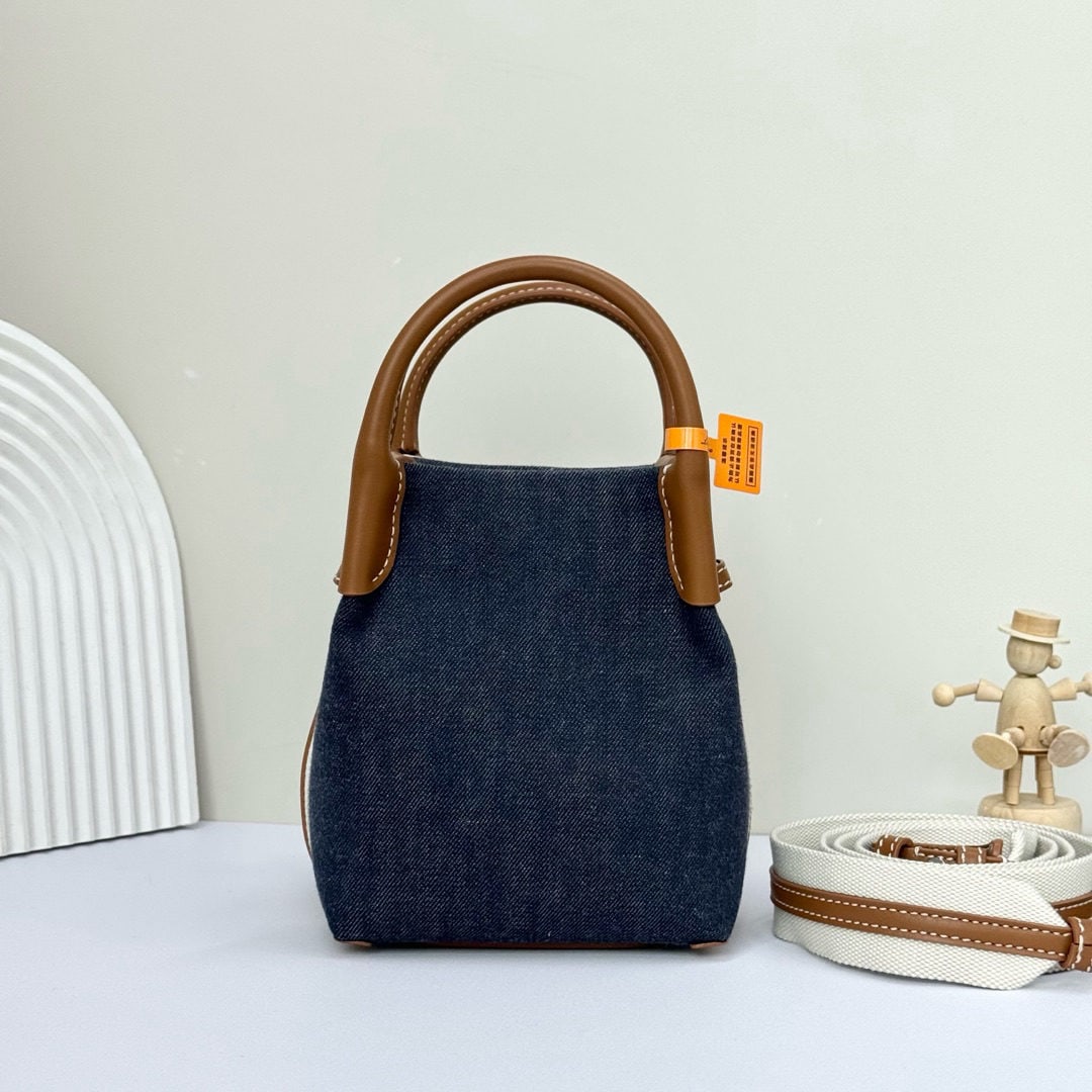 Loro piana Bale Mini Bucket Bag: We offer FREE SHIPPING for both domestic and international clients who bid over $500. The Loro Piana Bale mini bucket bag in blue denim is crafted from signature Flower denim, featuring hand-stitched 