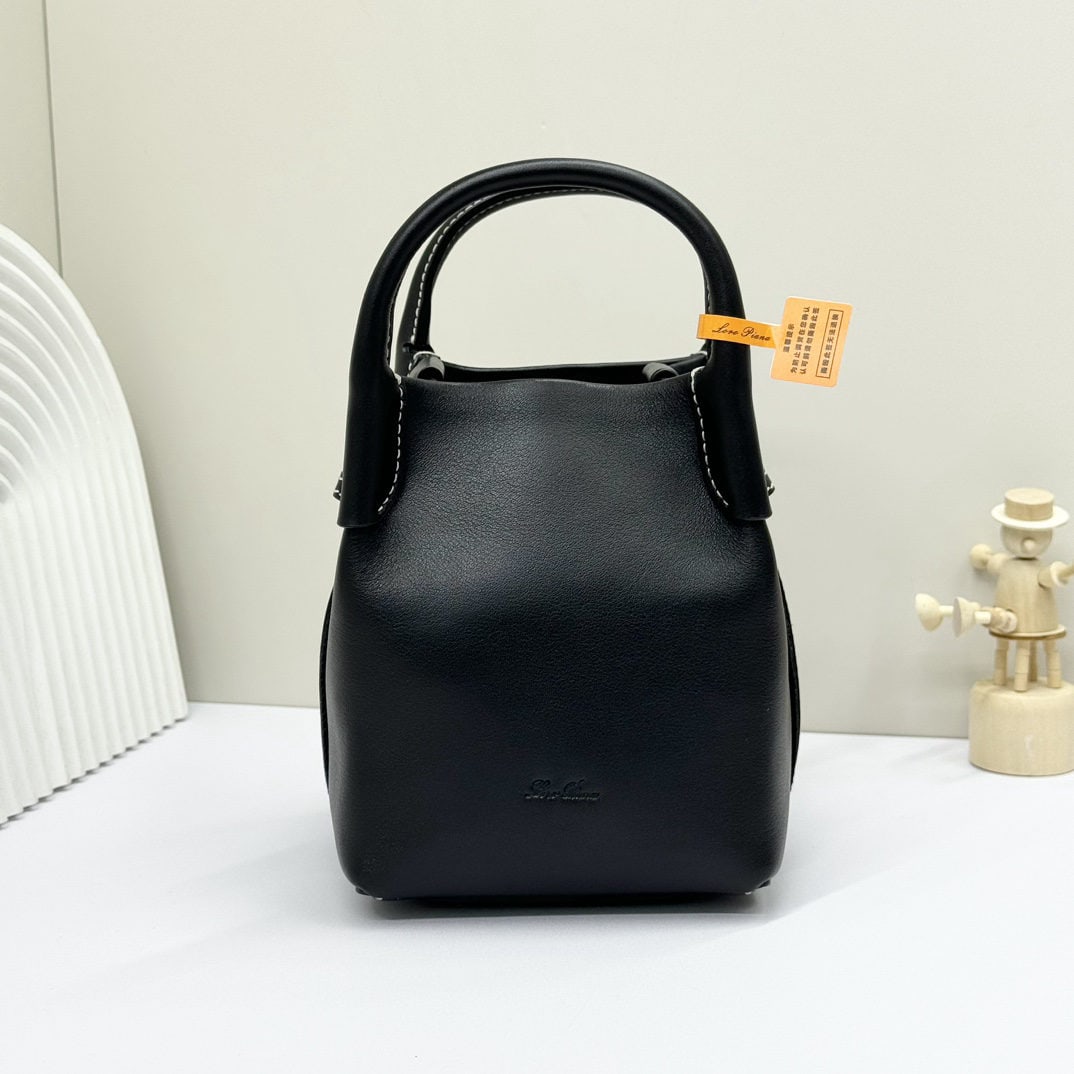 Loro piana Bale Mini Bucket Bag: We offer FREE SHIPPING for both domestic and international clients who bid over $500. The Loro Piana Bale mini bucket bag in black is crafted from signature Flower denim, featuring hand-stitched handl