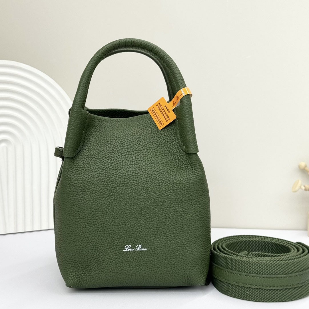 Loro piana Bale Mini Bucket Bag: We offer FREE SHIPPING for both domestic and international clients who bid over $500. The Loro Piana Bale mini bucket bag in Lichen Green is crafted from signature Flower denim, featuring hand-stitche