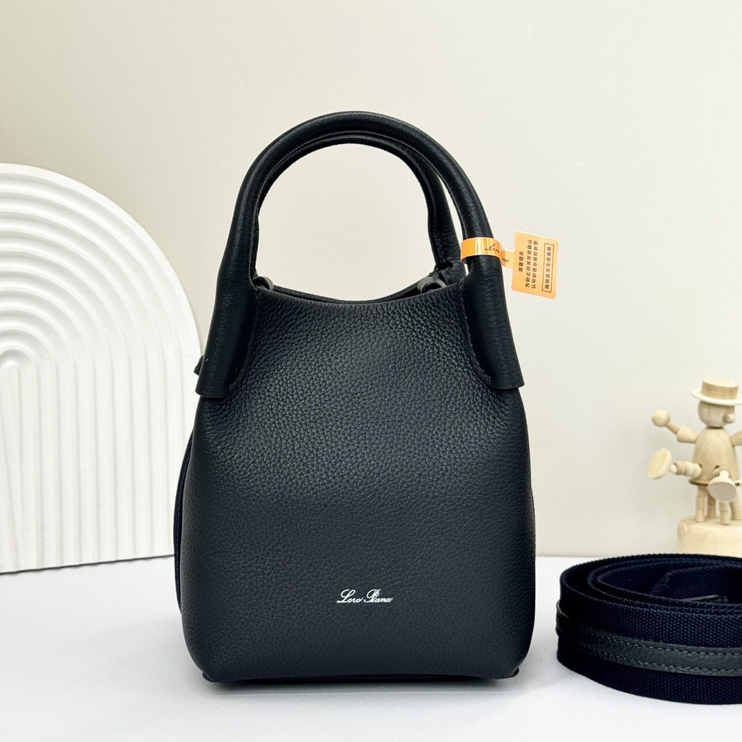 Loro piana Bale Mini Bucket Bag: We offer FREE SHIPPING for both domestic and international clients who bid over $500. The Loro piana Bale mini bucket bag in navy blue is crafted from signature Flower denim, featuring hand-stitched h