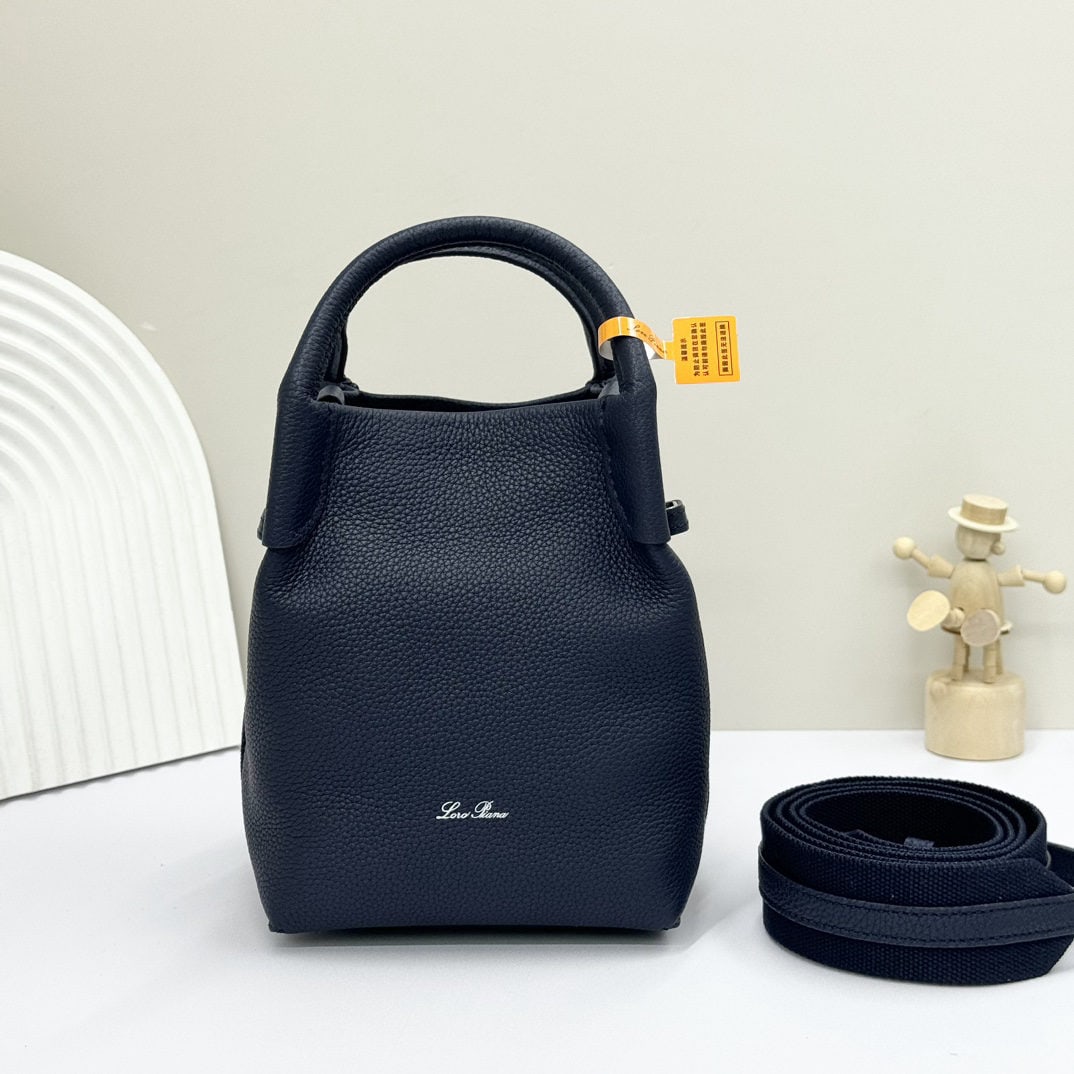 Loro piana Bale Mini Bucket Bag: We offer FREE SHIPPING for both domestic and international clients who bid over $500. The Loro piana Bale mini bucket bag in midnight blue is crafted from signature Flower denim, featuring hand-stitch