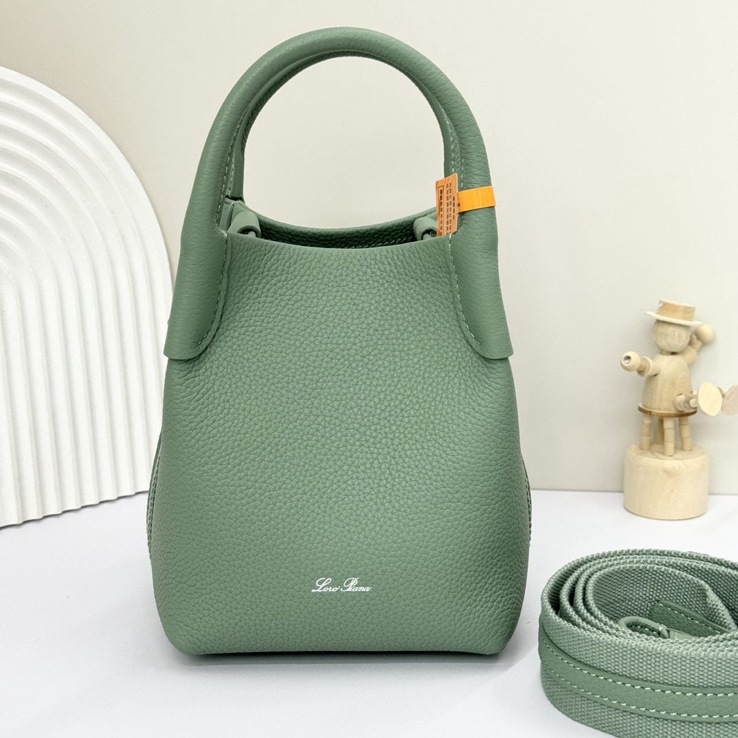 Loro piana Bale Mini Bucket Bag: We offer FREE SHIPPING for both domestic and international clients who bid over $500. The Loro piana Bale mini bucket bag in Artemisia argyi green is crafted from signature Flower denim, featuring han