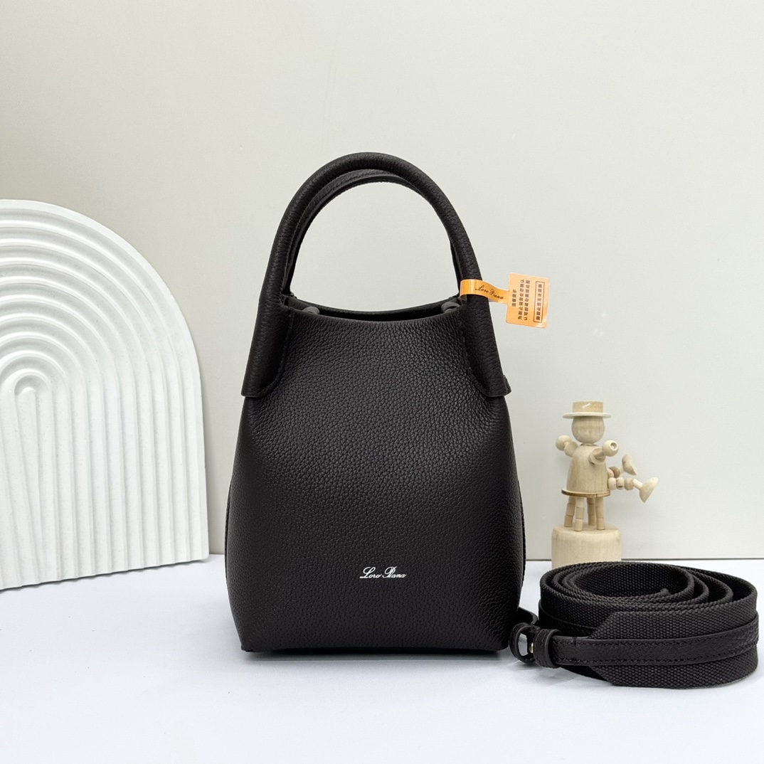 Loro piana Bale Mini Bucket Bag: We offer FREE SHIPPING for both domestic and international clients who bid over $500. The Loro Piana Bale mini bucket bag, in coffee color, is crafted from signature Flower denim. It features hand-sti