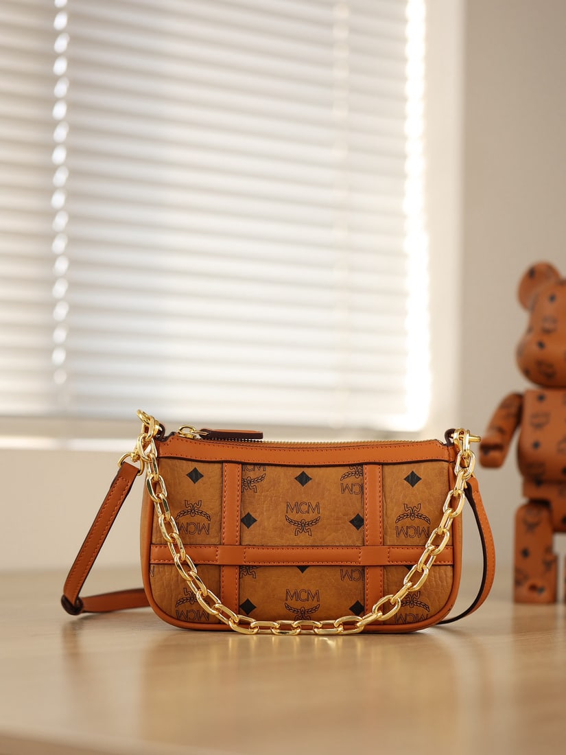 MCM bags: We offer FREE SHIPPING for both domestic and international clients who bid over $500. This exquisite bag features crisscrossing Nappa leather stripes reminiscent of a city's grid-like streets. It