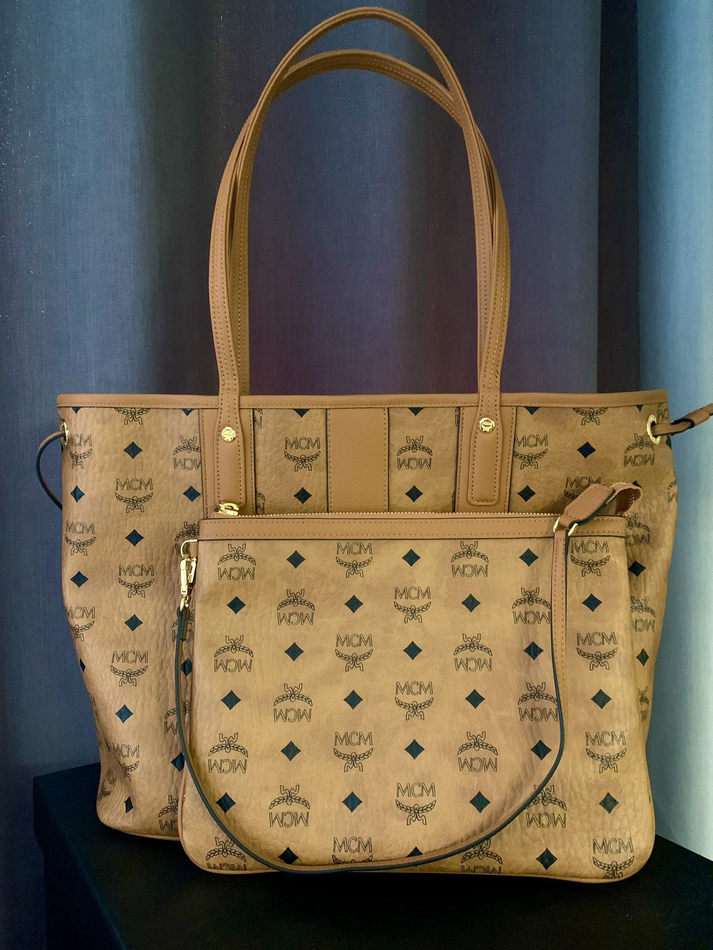 MCM Mother-and-Child Tote Bag: We offer FREE SHIPPING for both domestic and international clients who bid over $500. The MCM Liz Medium Shopper Tote Bag, made of cognac-colored Visetos material, exudes classic style and showcases m