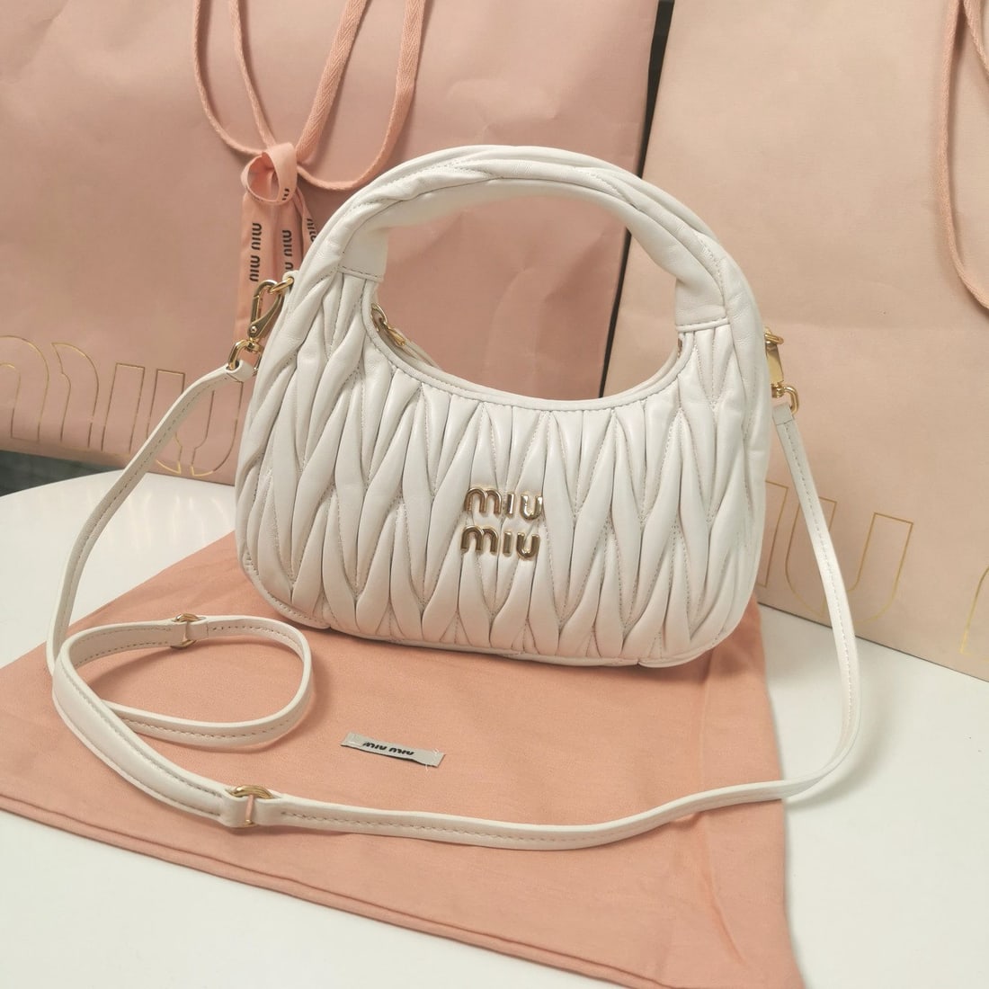 MIUMIU: We offer FREE SHIPPING for both domestic and international clients who bid over $500. MIUMIU 23 X 13 X 7CM A wonderful gift for you or your loved one. Currencies including USD, CAD, GBP, EUR, AUD,