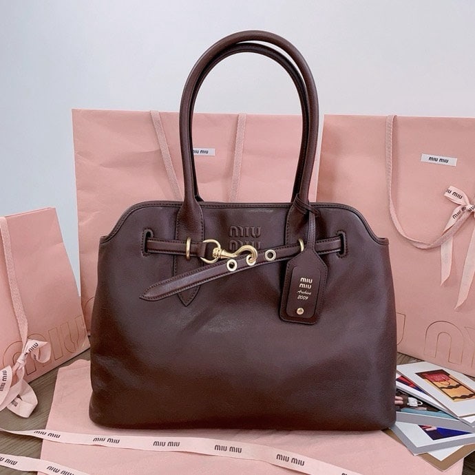MIUMIU: We offer FREE SHIPPING for both domestic and international clients who bid over $500. MIUMIU 31 X 40 X 13CM A wonderful gift for you or your loved one. Currencies including USD, CAD, GBP, EUR, AUD,