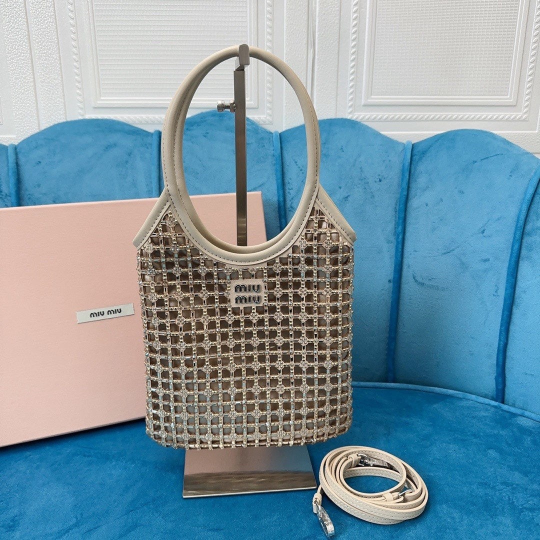 MIUMIU: We offer FREE SHIPPING for both domestic and international clients who bid over $500. MIUMIU 20 X 24CM A wonderful gift for you or your loved one. Currencies including USD, CAD, GBP, EUR, AUD, etc.