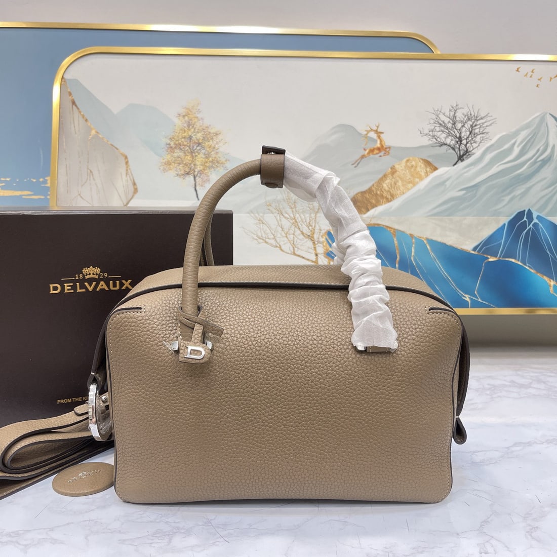 Delvaux: We offer FREE SHIPPING for both domestic and international clients who bid over $500. The most striking feature of the Delvau semi-handcrafted Cool Box is its unique D-shaped pull tab and cubic
