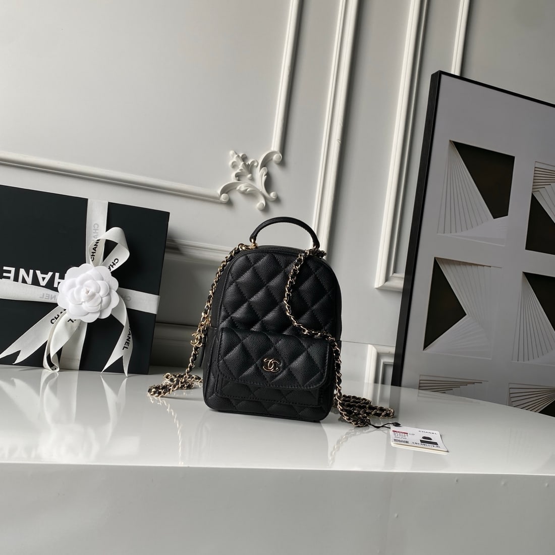 CHANEL Early Spring Resort Collection Mini Backpack with Lychee Pattern: We offer FREE SHIPPING for both domestic and international clients who bid over $500. CHANEL Cruise Collection Mini Backpack with Pebbled Texture, Light Gold Vintage Style, Classic Gold Hardware, Leat