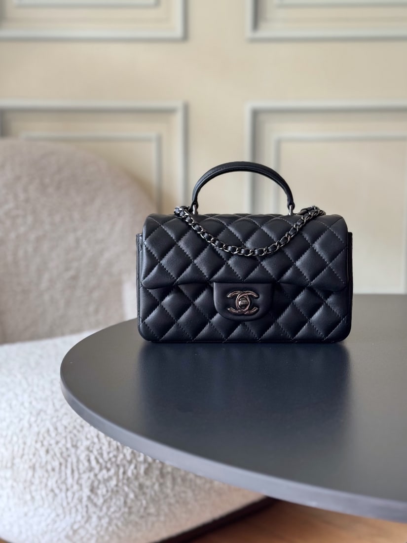 CHANEL's latest Mini CF handle handbag: We offer FREE SHIPPING for both domestic and international clients who bid over $500. CHANEL's latest Mini CF handle tote bag features a classic quilted flap closure and a delicate chain handle. Made 
