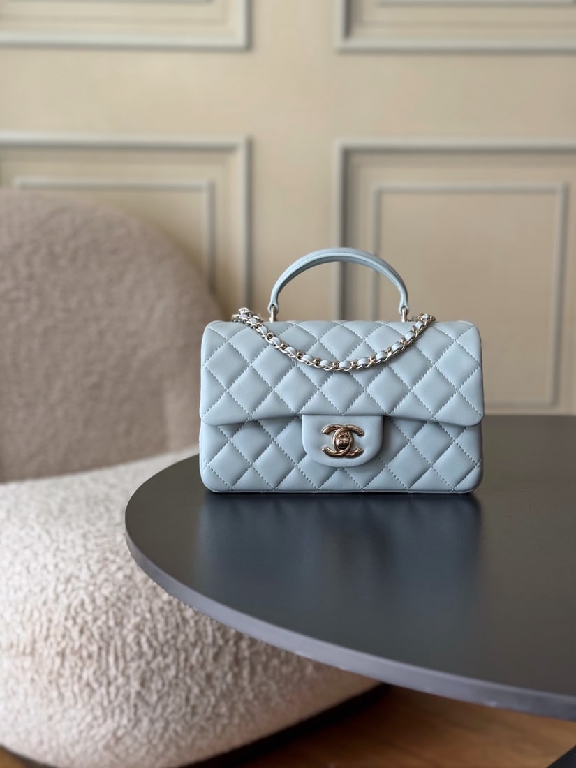 CHANEL's latest Mini CF handle handbag: We offer FREE SHIPPING for both domestic and international clients who bid over $500. CHANEL's latest Mini CF handle tote bag features a classic quilted flap closure and a delicate chain handle. Made 