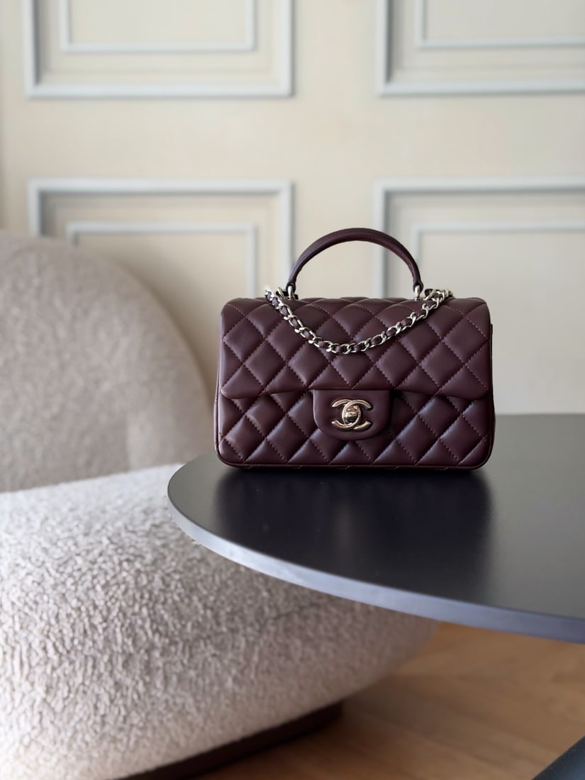 CHANEL's latest Mini CF handle handbag: We offer FREE SHIPPING for both domestic and international clients who bid over $500. CHANEL's latest Mini CF handle tote bag features a classic quilted flap closure and a delicate chain handle. Made 