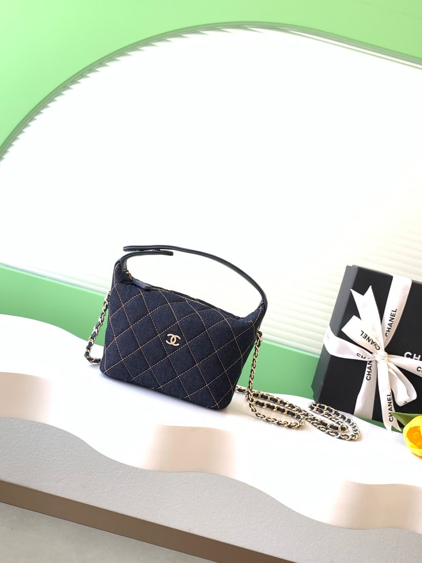 CHANEL Denim Lunchbox Bag: We offer FREE SHIPPING for both domestic and international clients who bid over $500. This denim lunchbox bag features dark denim with a classic quilted pattern, a metal chain, and a leather shoulder 