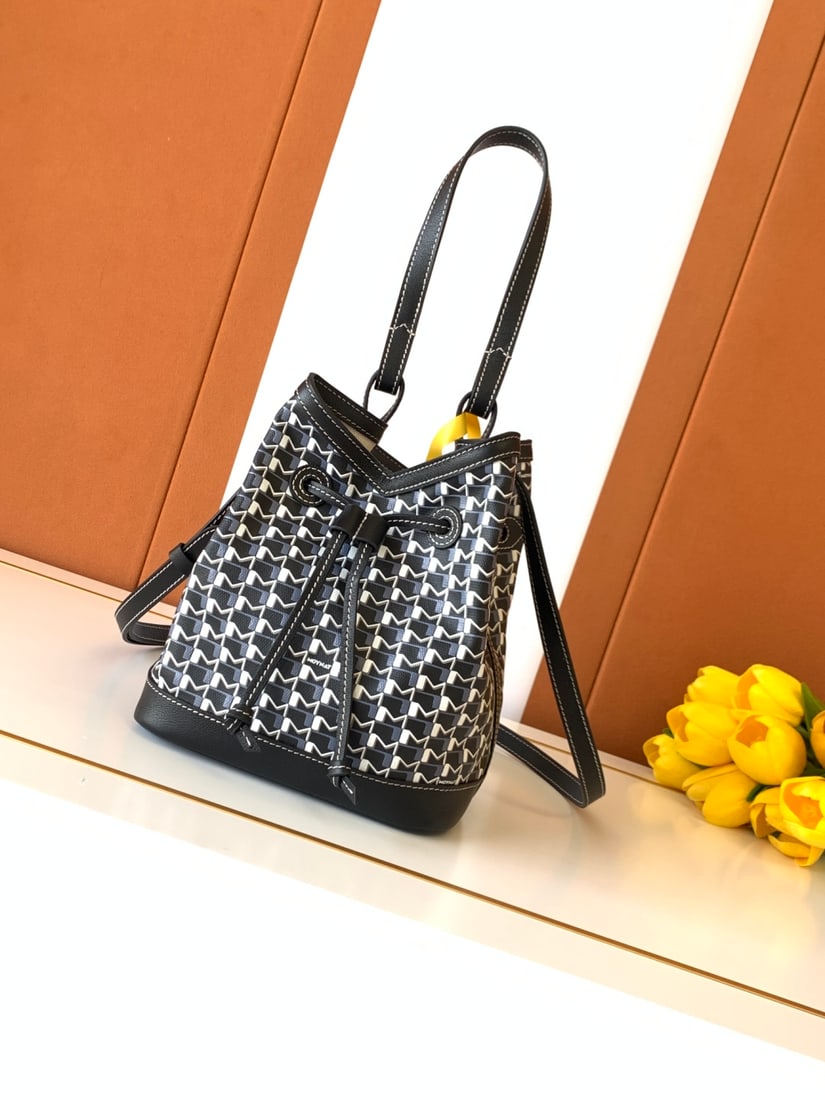 Moynat Canvas Bucket Bag: We offer FREE SHIPPING for both domestic and international clients who bid over $500. The Canvas series bucket bag is an urban and timeless creation. Moynat's "M" bucket bag highlights its casual styl