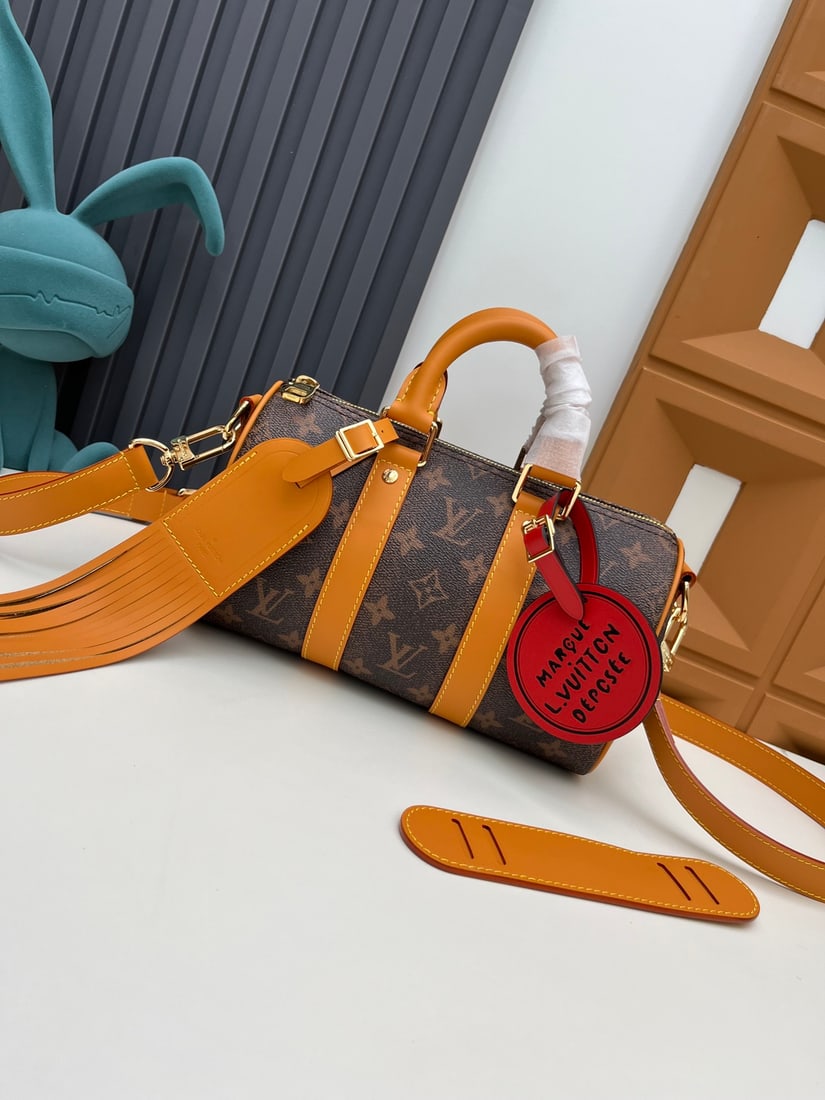 Keepall Bandouli??re handbag: We offer FREE SHIPPING for both domestic and international clients who bid over $500. The new Keepall Bandouli??re handbag features a top handle, detachable shoulder strap, and reinforced side straps