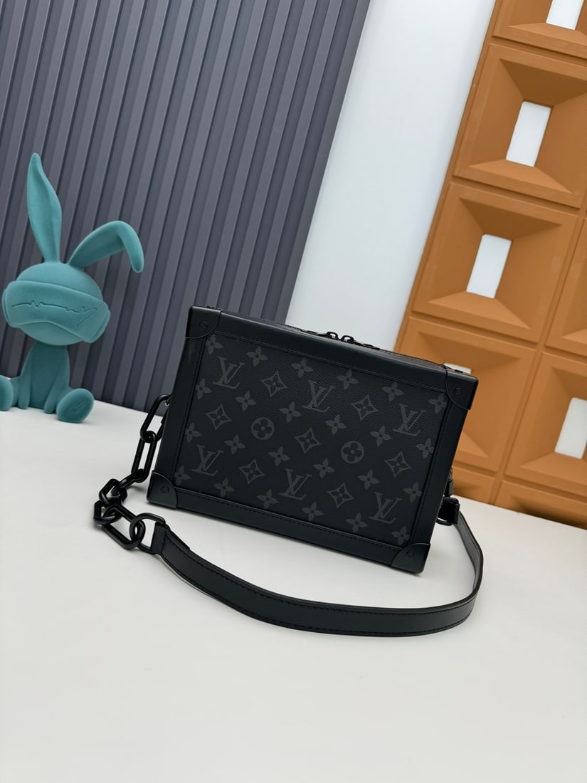 Soft Trunk Handbag: We offer FREE SHIPPING for both domestic and international clients who bid over $500. The Soft Trunk handbag combines Monogram embossed Taurillon leather with a matte zipper and shoulder strap.