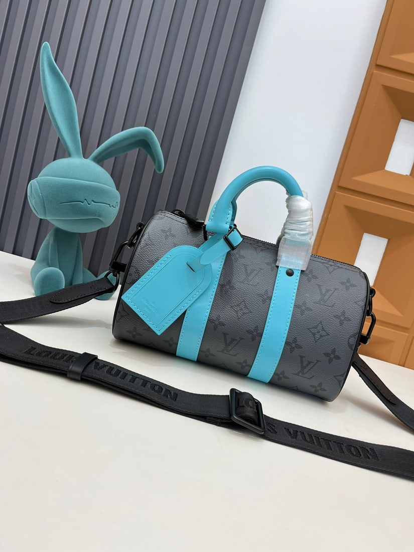 LV pillow bag: We offer FREE SHIPPING for both domestic and international clients who bid over $500. The Turquoise Collection Pillow Bag: This Keepall 25 handbag is crafted from Monogram Eclipse Reverse canvas.
