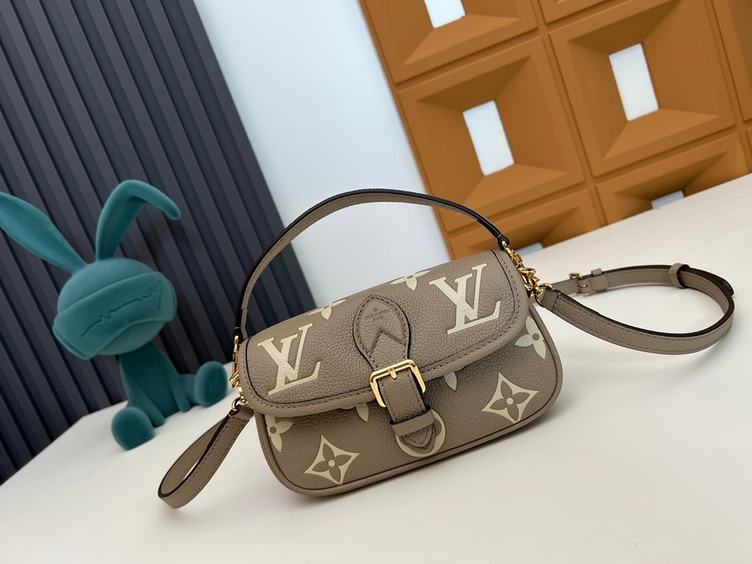 NEW Nano Diane handbag: We offer FREE SHIPPING for both domestic and international clients who bid over $500. The NEW Nano Diane mini baguette bag from the all-leather collection features a detachable handle for versatile