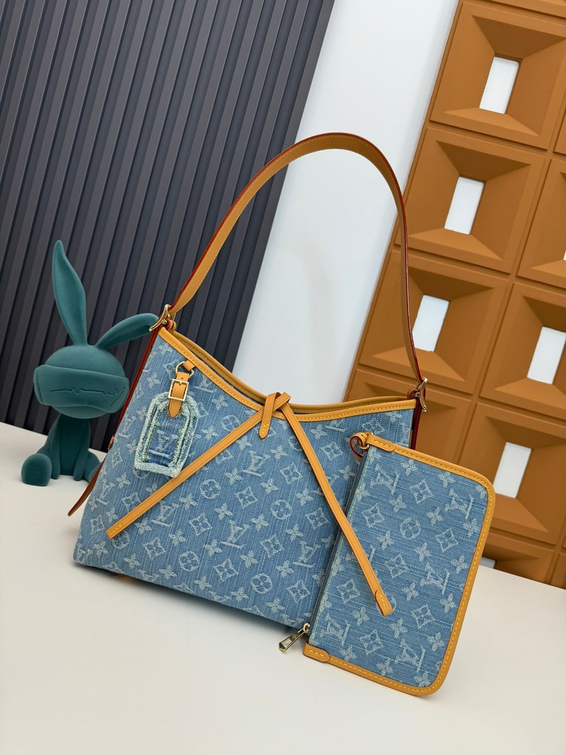 Carryall small handbag: We offer FREE SHIPPING for both domestic and international clients who bid over $500. The light blue denim shopping bag from the Carryall small collection. This CarryAll bag combines Monogram Demin Hr