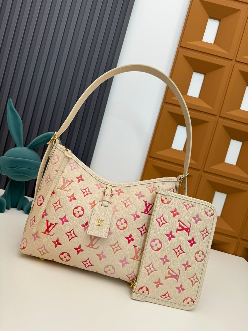 CarryAll Small Handbag: We offer FREE SHIPPING for both domestic and international clients who bid over $500. This gradient-colored CarryAll small handbag is crafted from Monogram Empreinte embossed leather, its soft